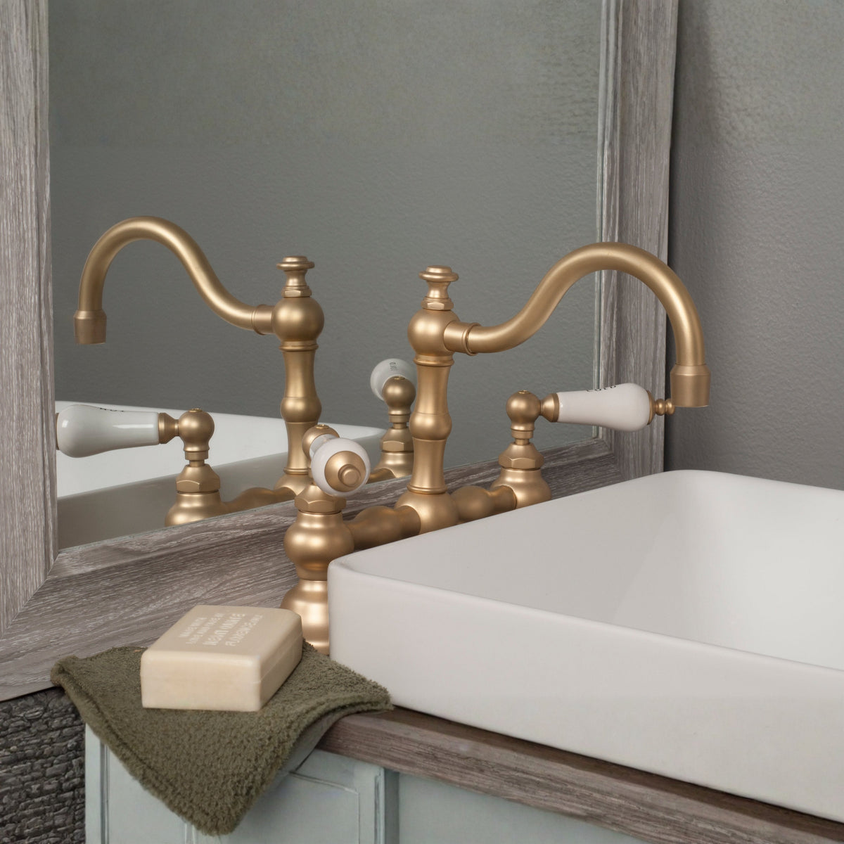 Brass bridge faucet on a bathroom vanity