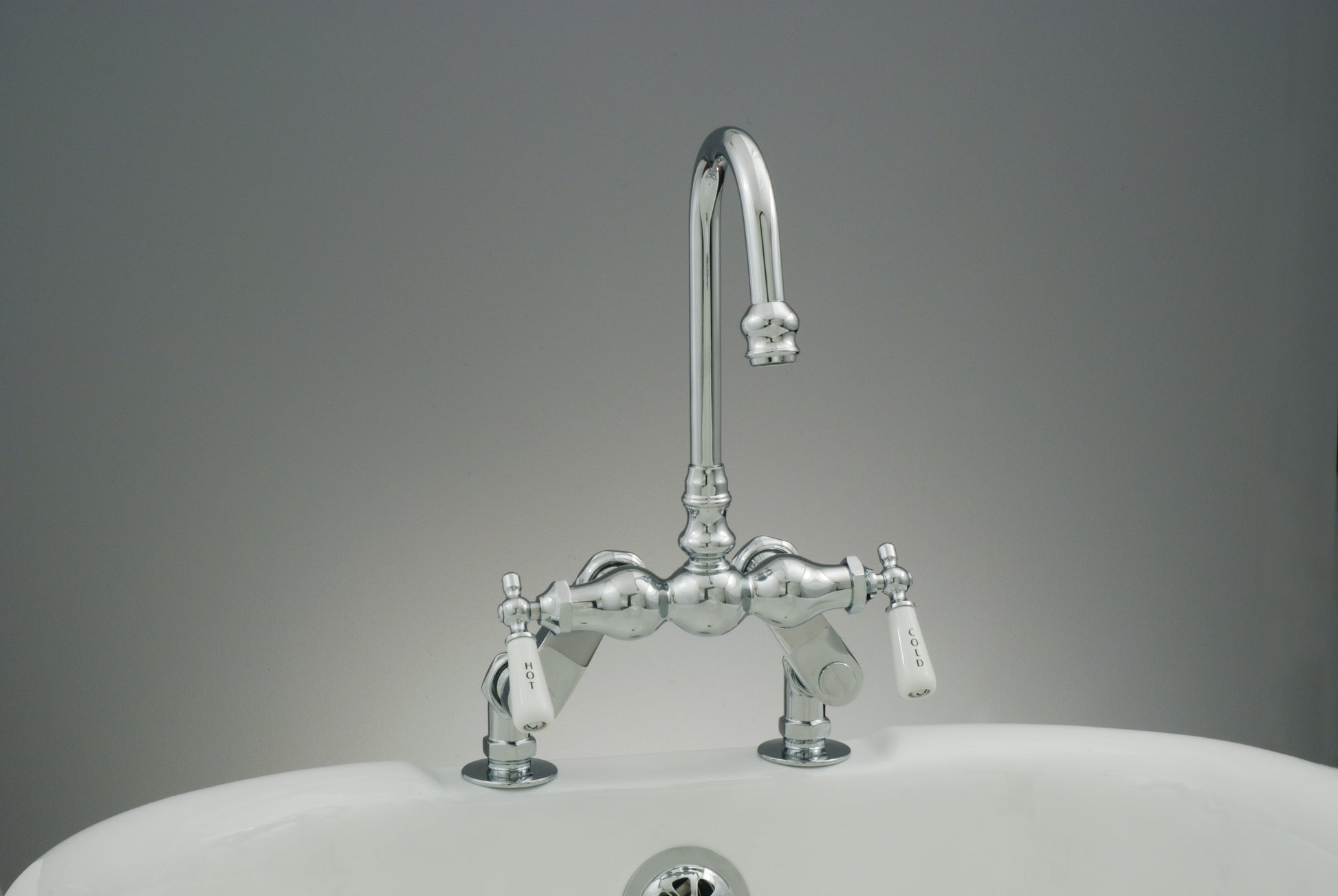 Strom Living Deck Mount Faucet with Porcelain Lever Handles